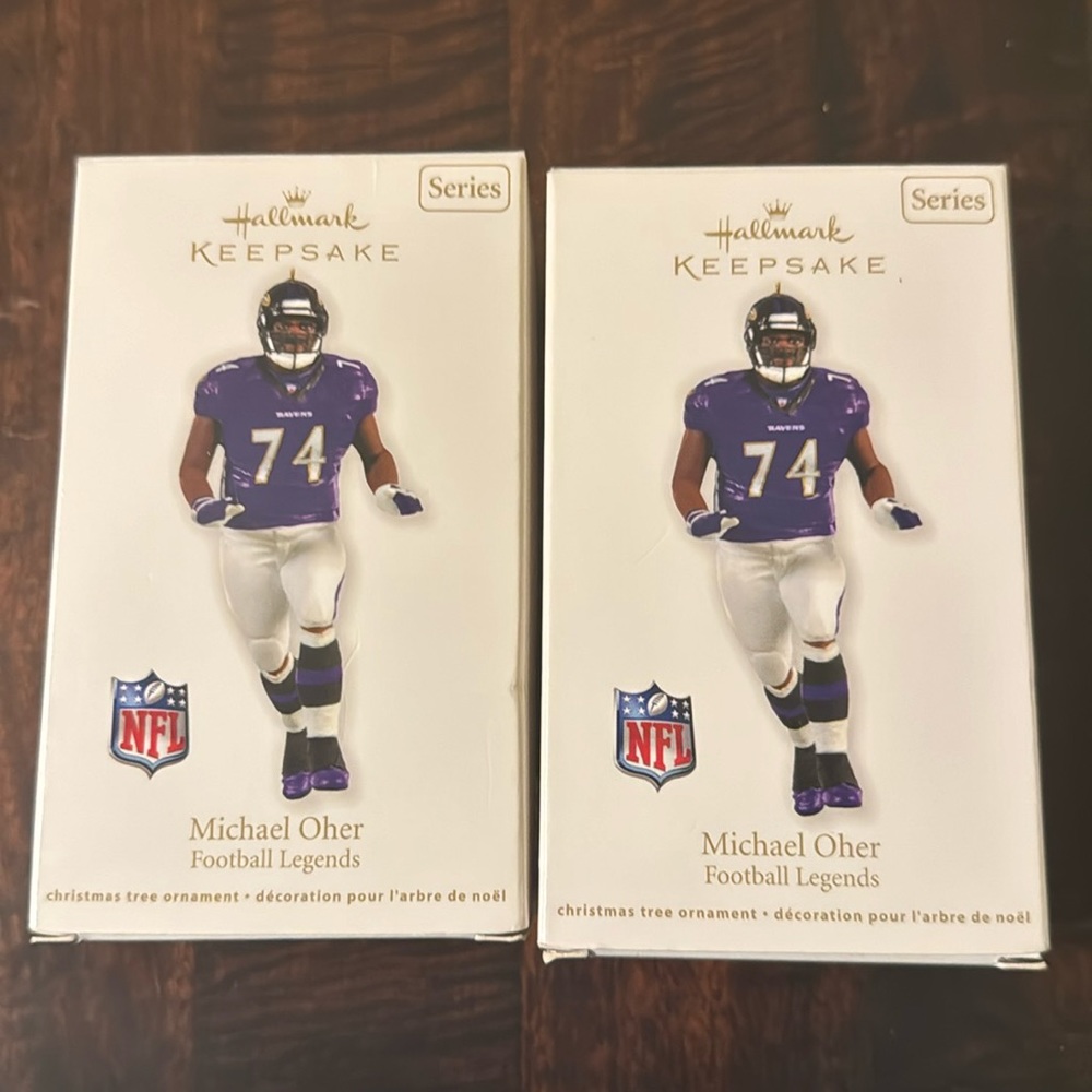 Two Michael Oher hallmark ornaments